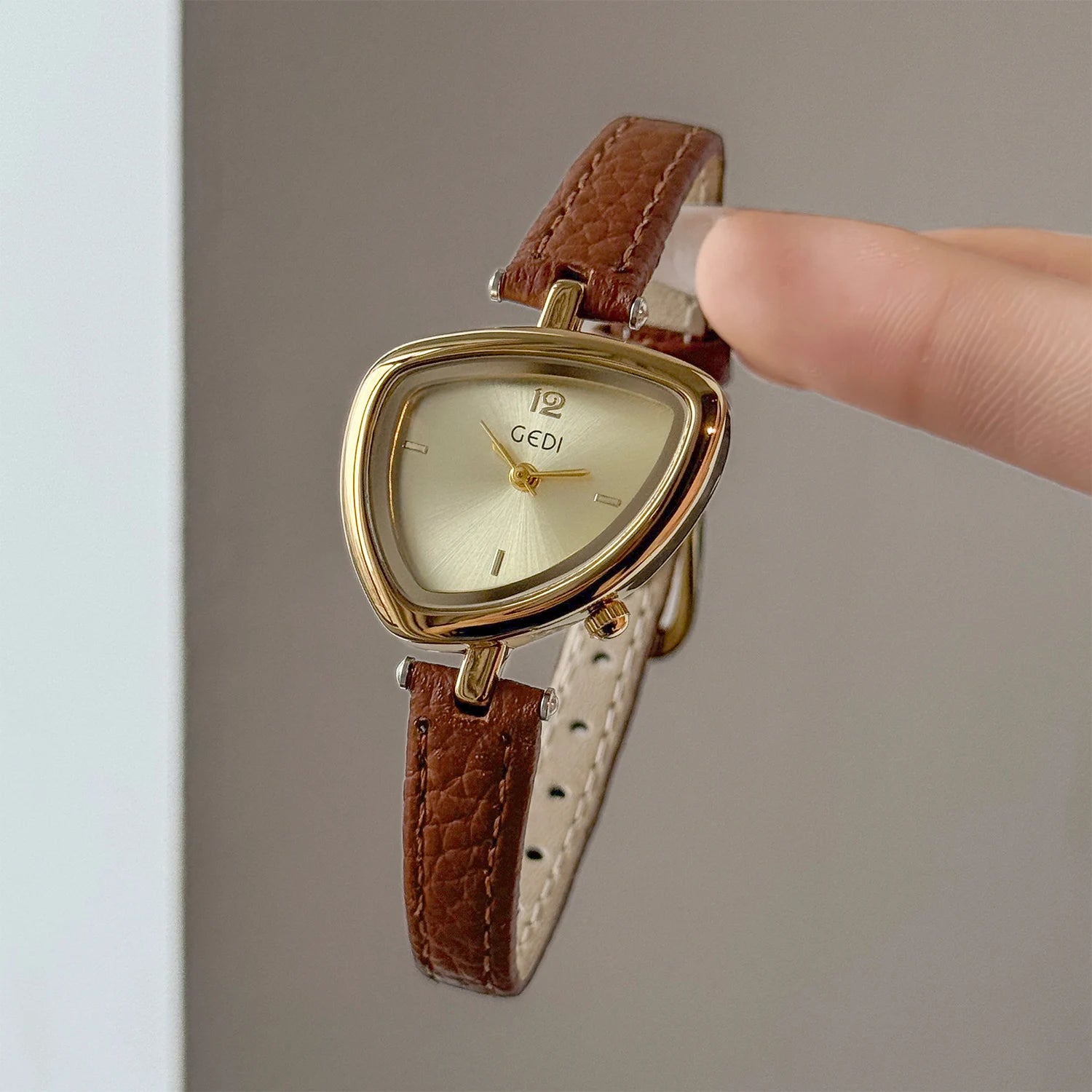 Artistic Essence: Asymmetrical Luxury Watch with Slim Leather Band