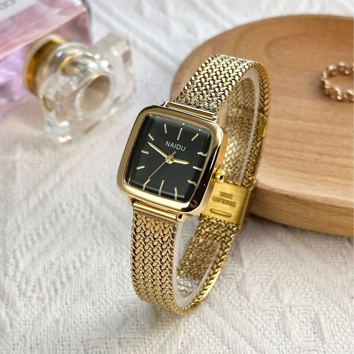 Golden Radiance: Delicate Square Dial Bracelet Watch