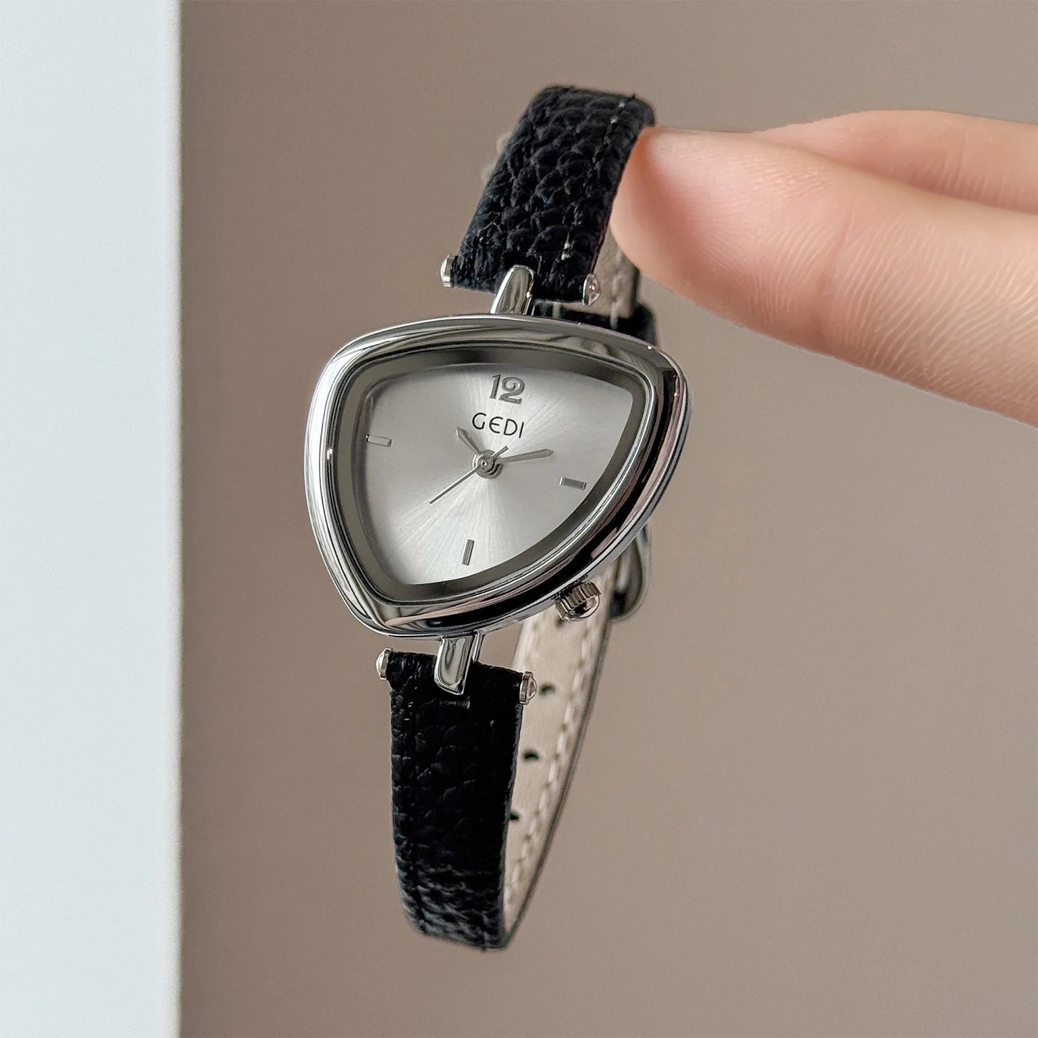 Artistic Essence: Asymmetrical Luxury Watch with Slim Leather Band