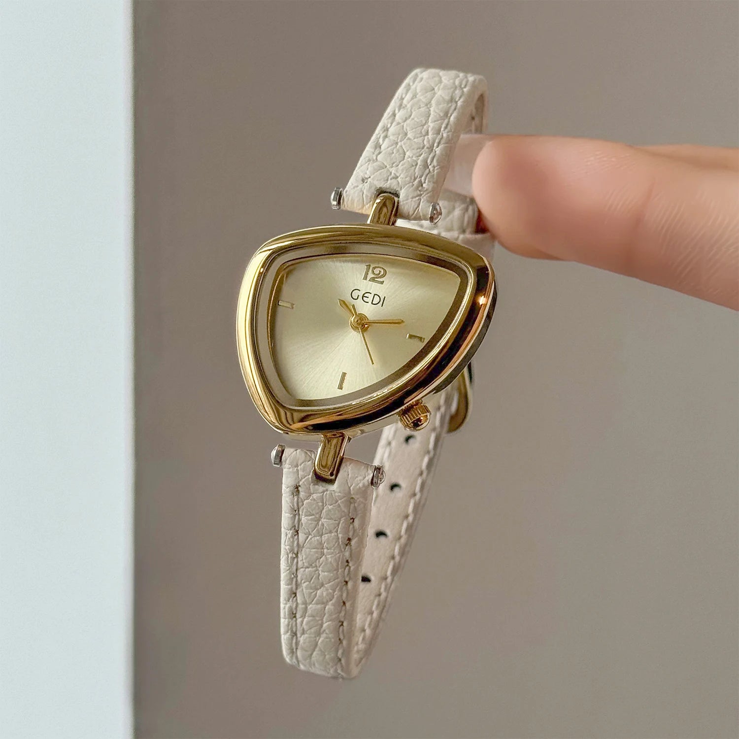 Artistic Essence: Asymmetrical Luxury Watch with Slim Leather Band