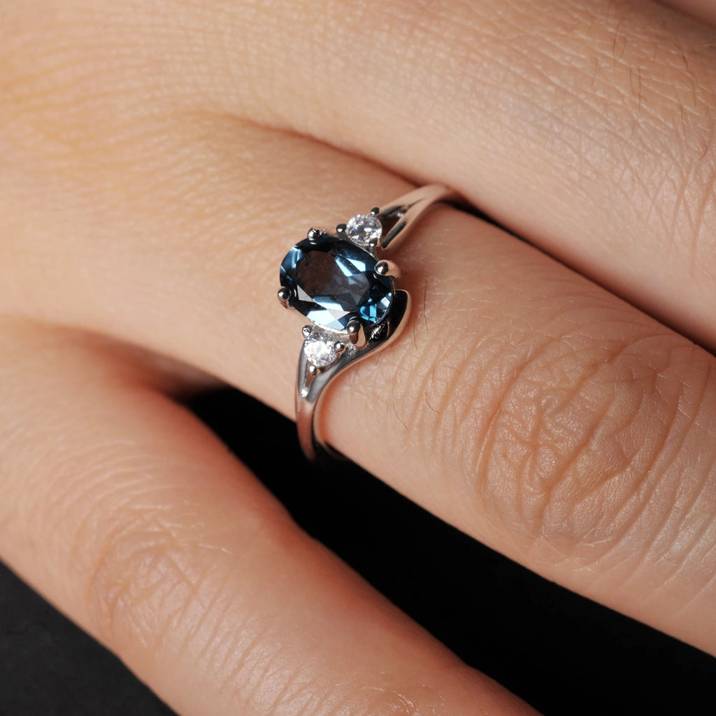 Deep Sea Elegance: POTIY Natural London Blue Topaz Solitaire
