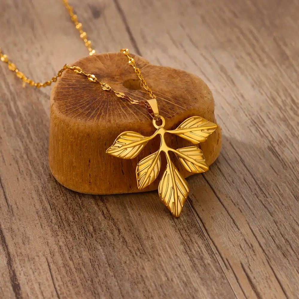 Verdant Muse – Golden Leaf Pendant
