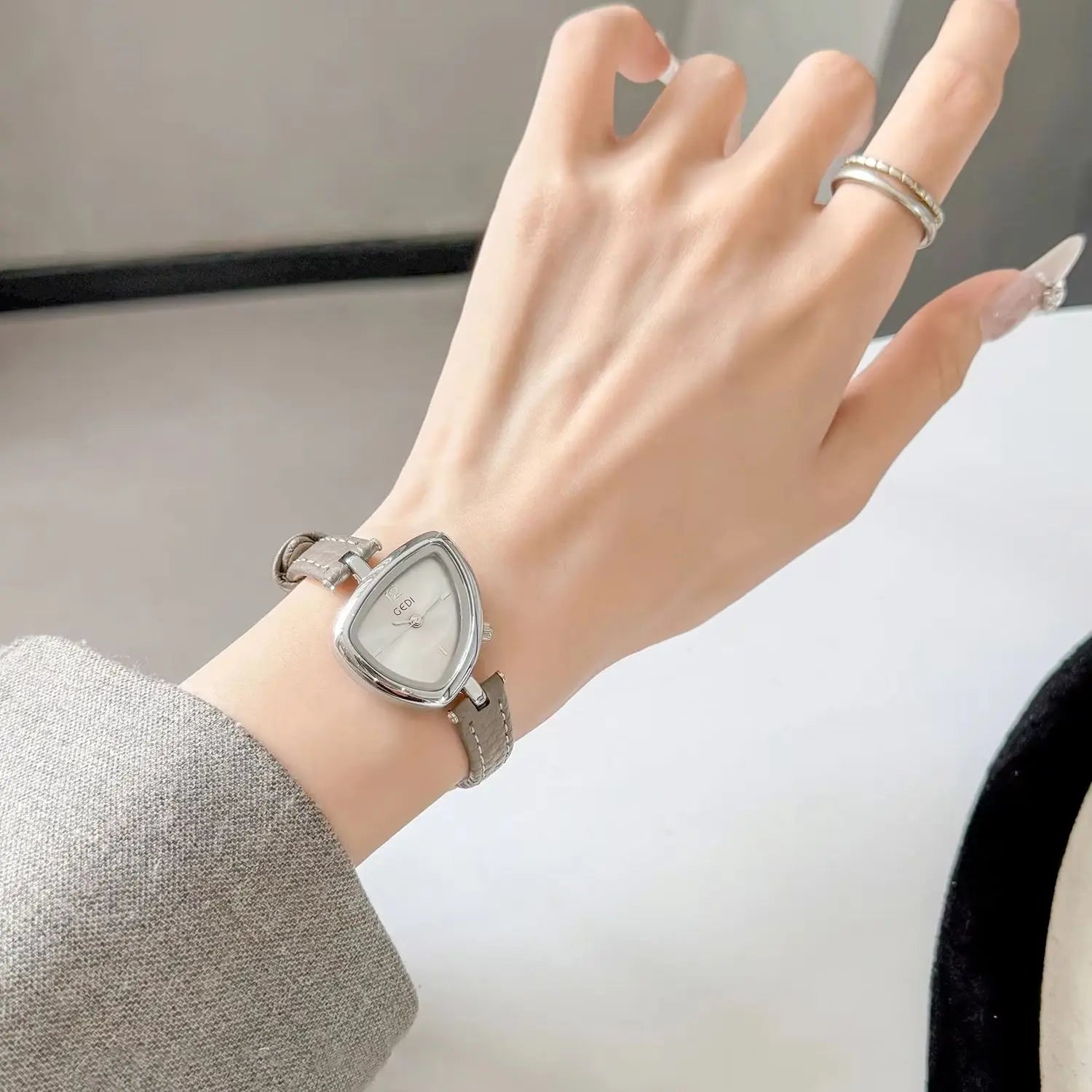 Artistic Essence: Asymmetrical Luxury Watch with Slim Leather Band