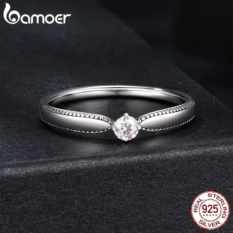 The Exquisite Moissanite Solitaire Band in Pure Sterling Silver