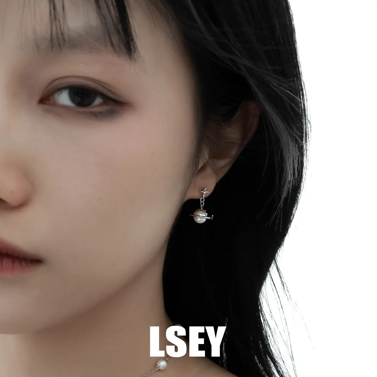 Celestial Grace: Minimalist Saturn Pearl & Sterling Silver Studs