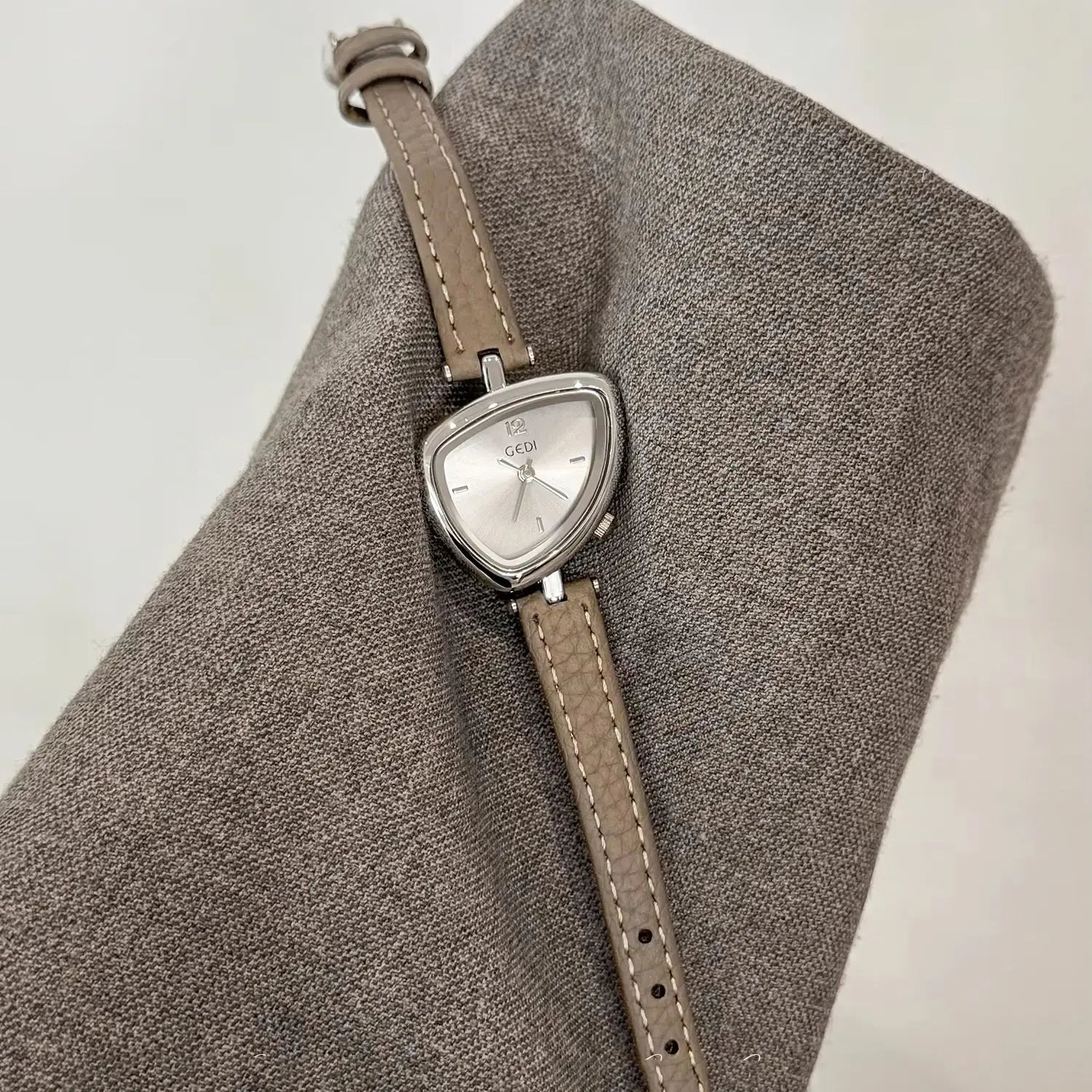 Artistic Essence: Asymmetrical Luxury Watch with Slim Leather Band