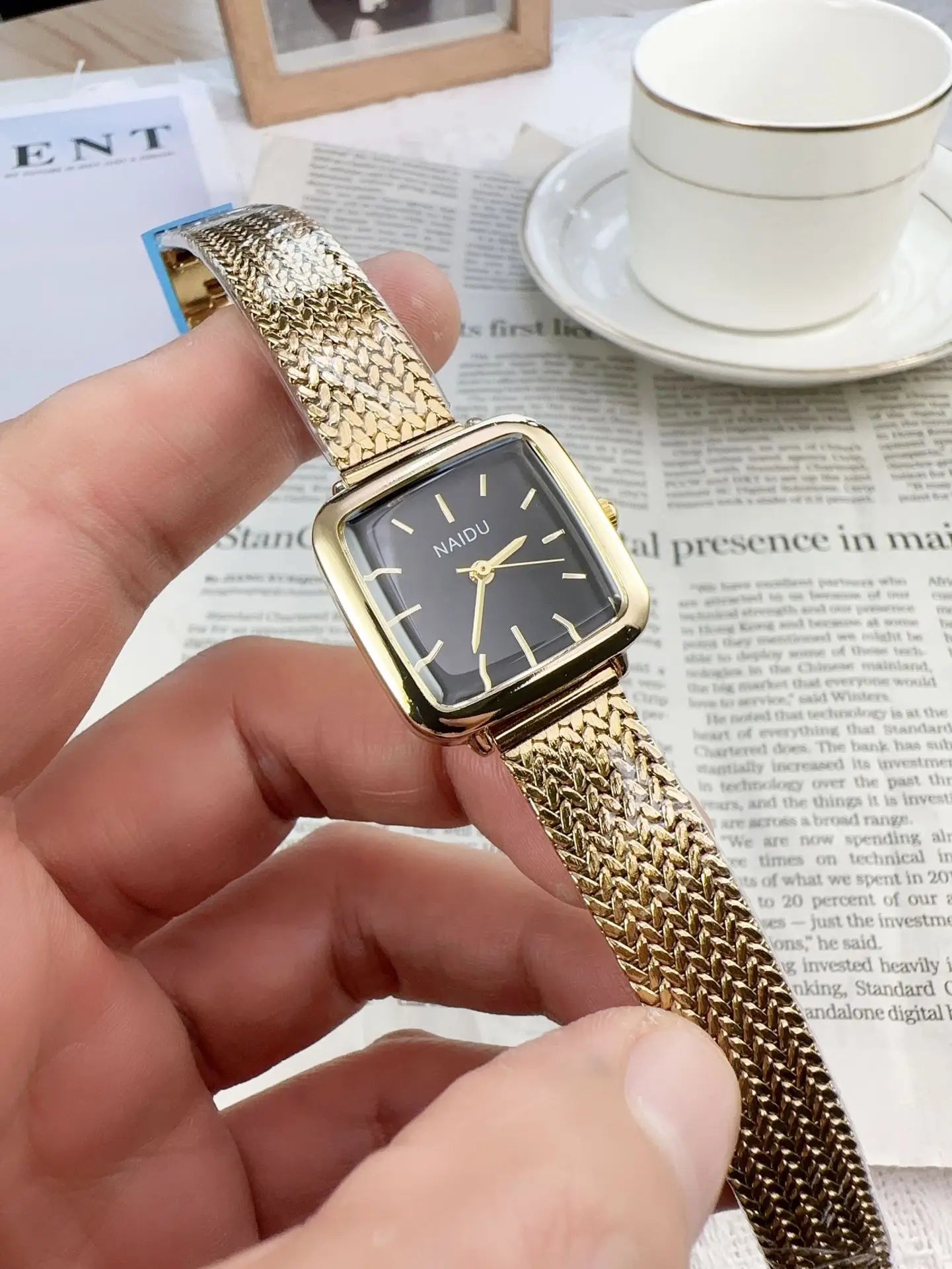 Golden Radiance: Delicate Square Dial Bracelet Watch