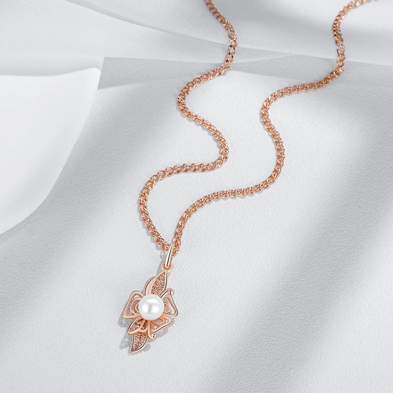 Blossom of Serenity – Pearl & Rose Gold Flower Pendant