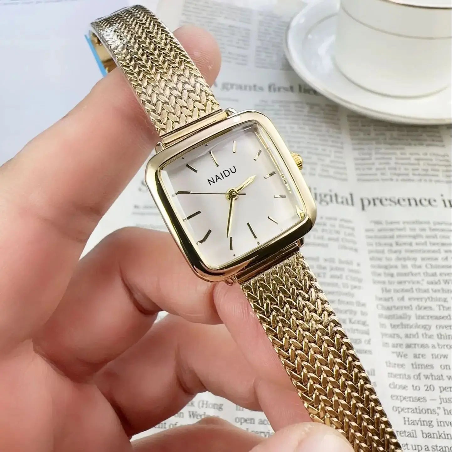 Golden Radiance: Delicate Square Dial Bracelet Watch