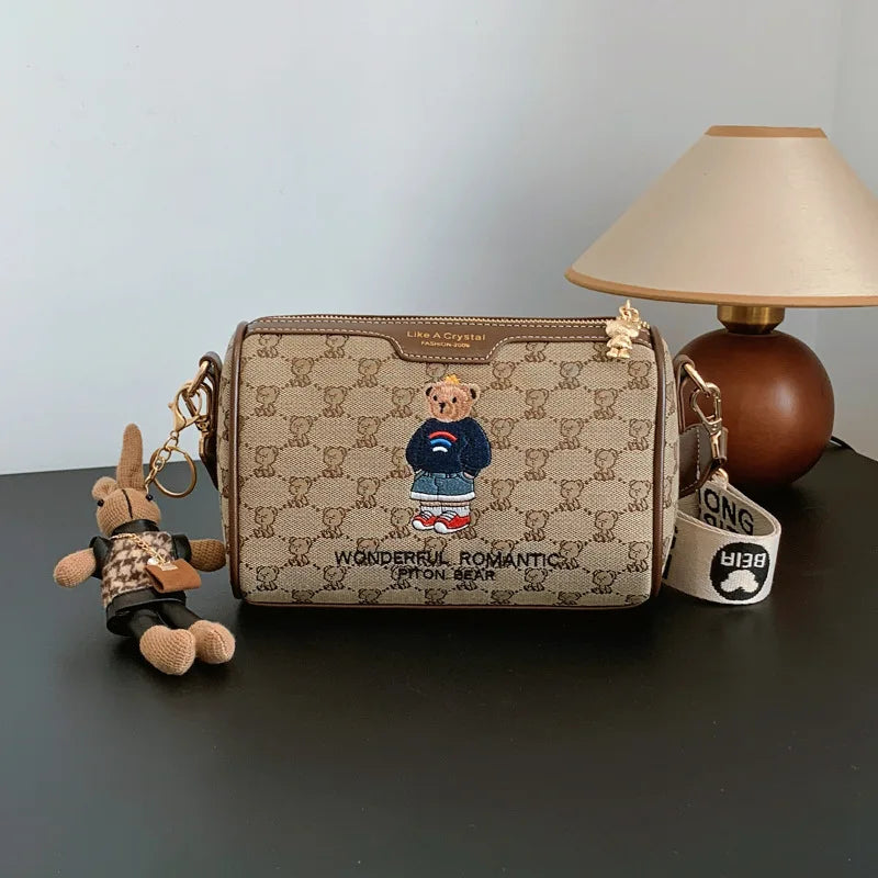 Artisan Texture Embroidered Cylindrical Canvas Messenger