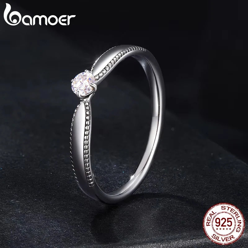 The Exquisite Moissanite Solitaire Band in Pure Sterling Silver