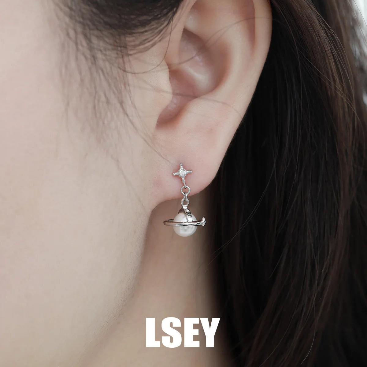 Celestial Grace: Minimalist Saturn Pearl & Sterling Silver Studs