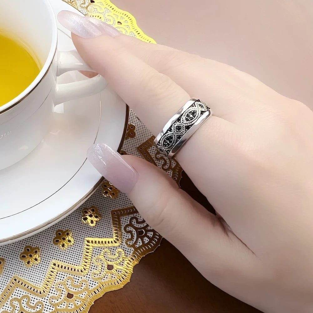 The Golden Bond: Love Knot Wave Ring in 925 Sterling Silver