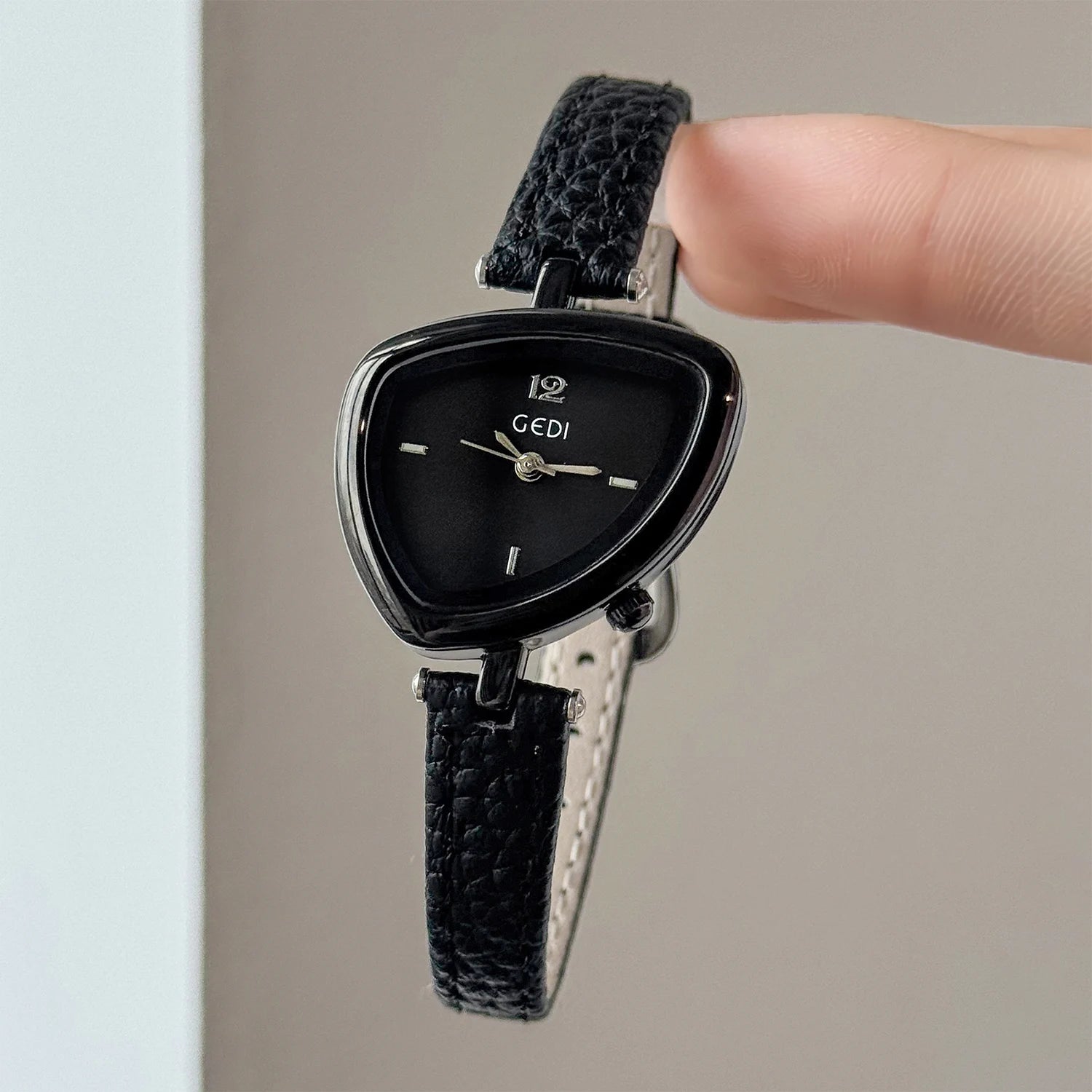 Artistic Essence: Asymmetrical Luxury Watch with Slim Leather Band