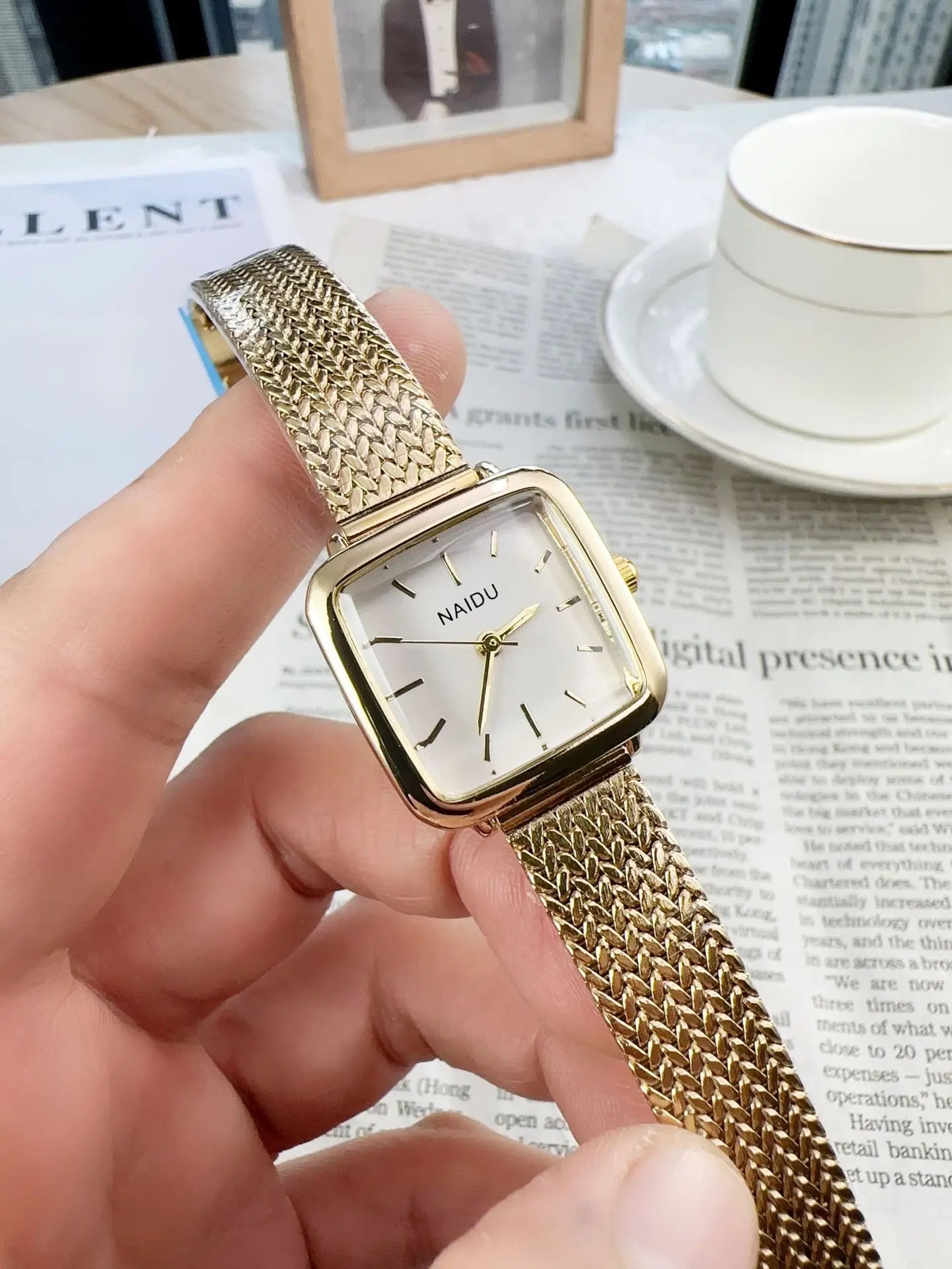 Golden Radiance: Delicate Square Dial Bracelet Watch