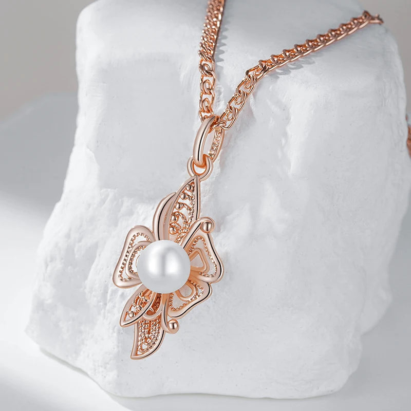Blossom of Serenity – Pearl & Rose Gold Flower Pendant