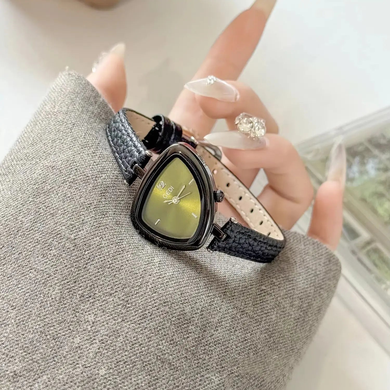 Artistic Essence: Asymmetrical Luxury Watch with Slim Leather Band