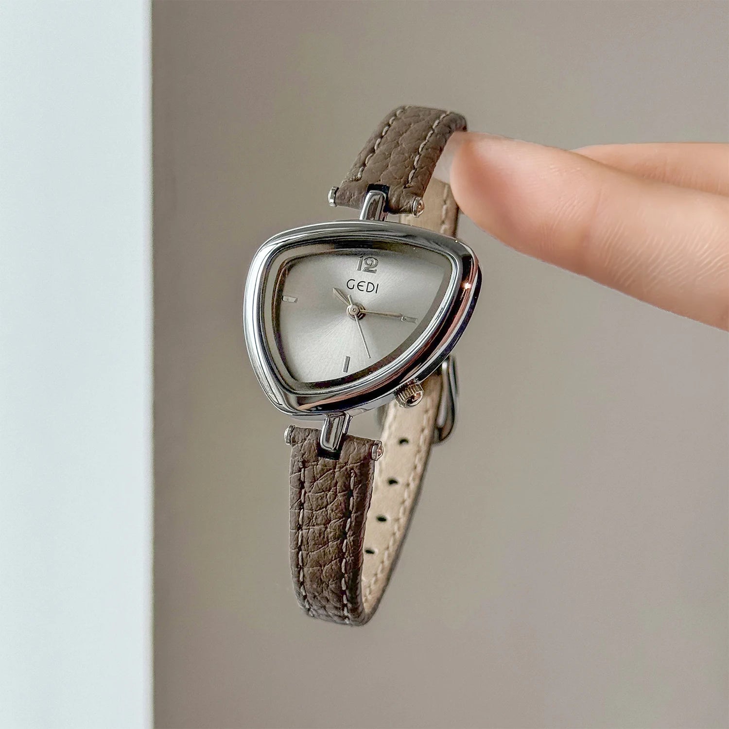 Artistic Essence: Asymmetrical Luxury Watch with Slim Leather Band