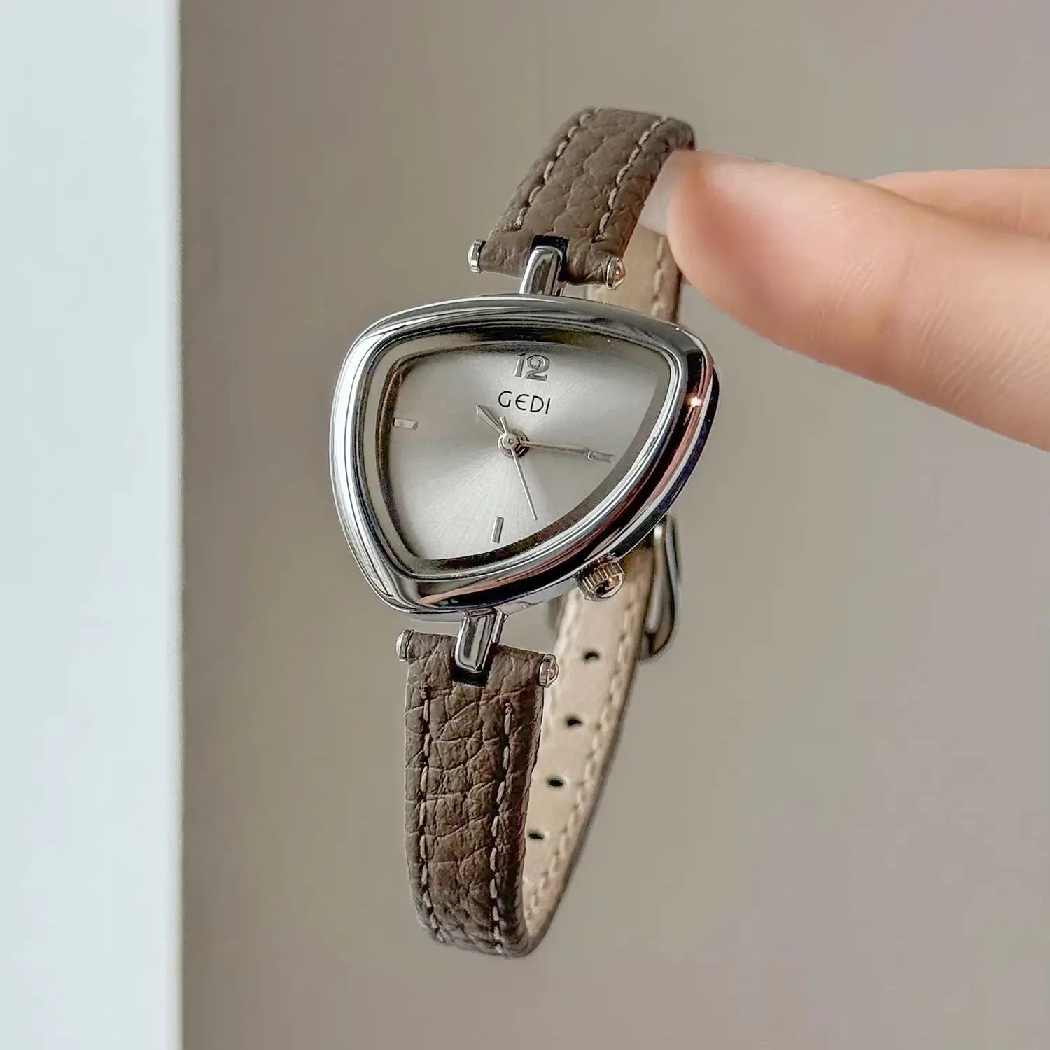 Artistic Essence: Asymmetrical Luxury Watch with Slim Leather Band