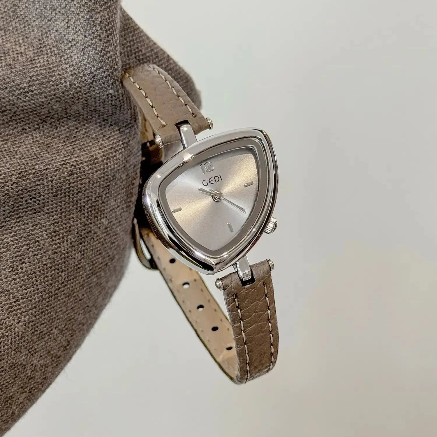 Artistic Essence: Asymmetrical Luxury Watch with Slim Leather Band