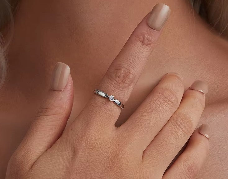 The Exquisite Moissanite Solitaire Band in Pure Sterling Silver